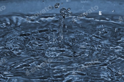 Preview: Raindrop Splatter - Close Up Photograph Of Raindrops Splashing Into Shallow Water. Filter Used For