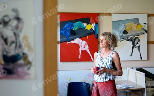 Preview: Female painter in her atelier, looking sideways