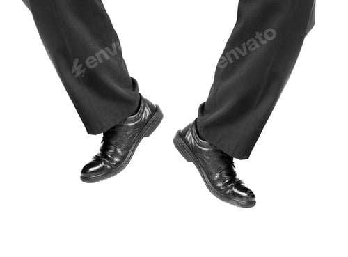 Preview: Feet of man in black shoes
