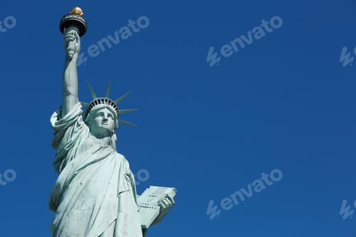 Preview: Statue of Liberty in a sunny day, blank blue sky space