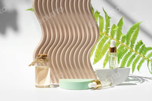 Preview: Empty green podium. Podium for advertising products with shadows. Natural oils in bottles