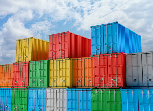 Preview: Group of colorful cargo containers under blue cloudy sky