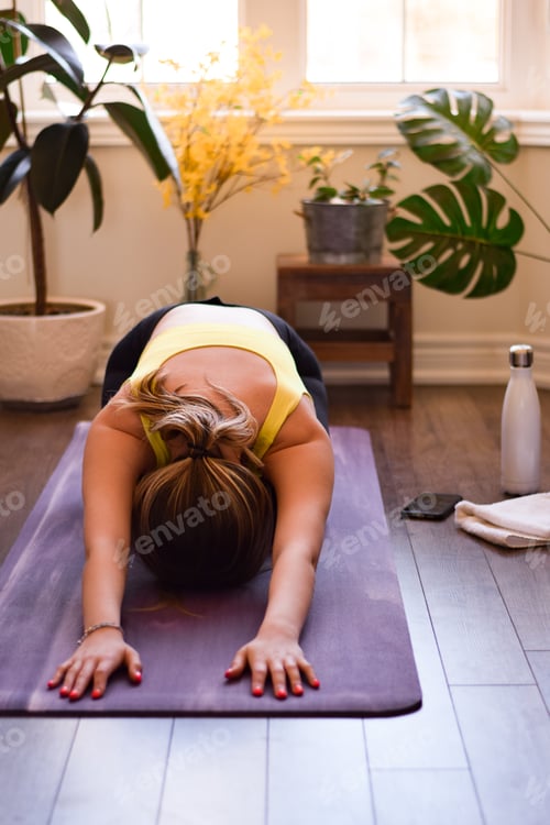 Preview: Woman Practices Yoga in Bright Indoor Setting