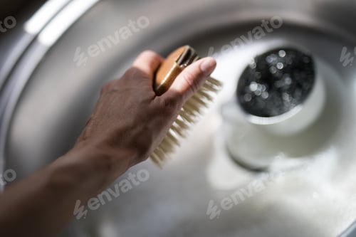 Preview: Kitchen sink lit by natural light from nearby window