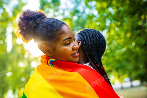 Preview: brazilian lesbian couple in white dress spending time together celebrating engagement in summer park