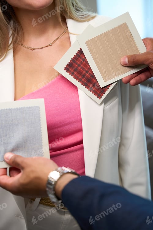 Preview: Couturier picking fabric color according to client skin tone