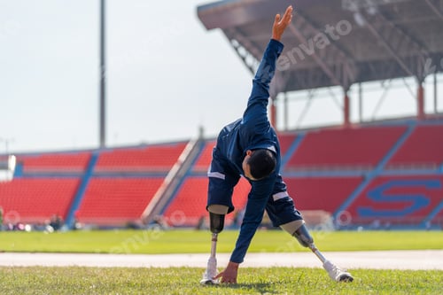 Preview: Sport man athlete with a prosthesis on his leg action of warm-up the body with stand