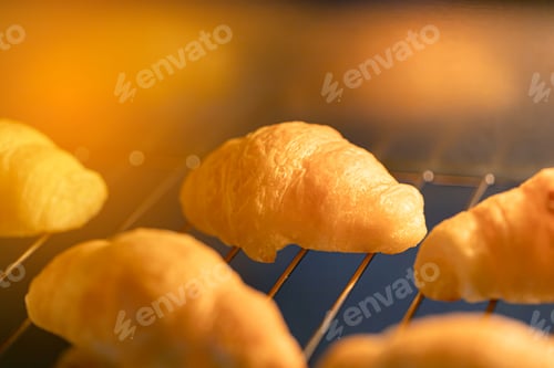 Preview: Dessert bread baking in oven. Production oven at the bakery.