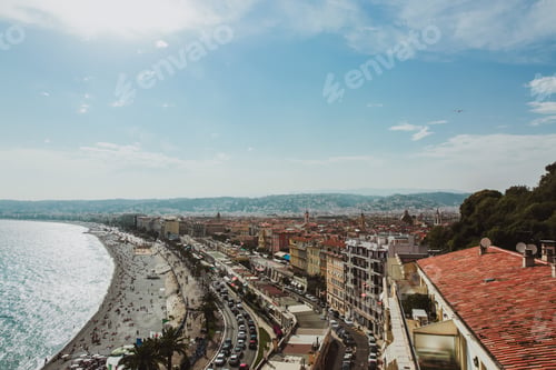 Preview: Panoramic view of Nice coastline and beach with blue sky, France