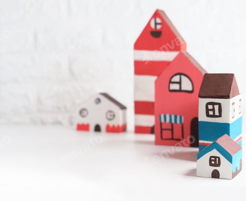 Preview: toy houses village, hand painted houses in red and blue colors.