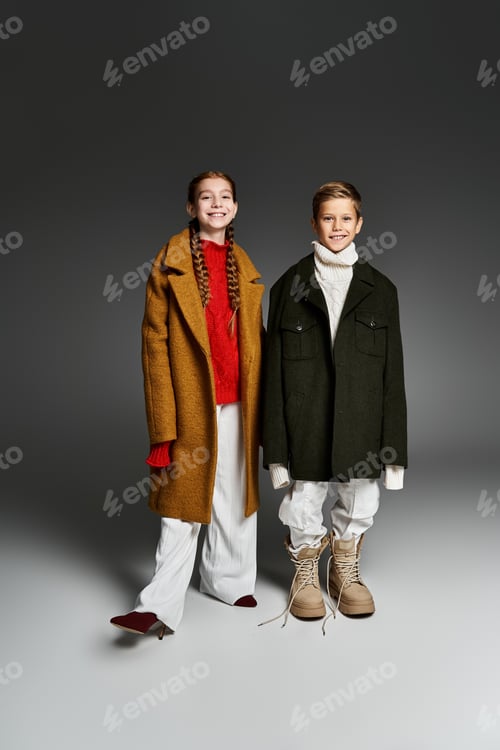 Preview: Cozy winter attire on children showcasing youthful fashion and warmth during atmospheric cold