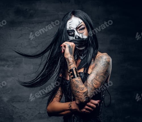 Preview: A woman with painted skull face.