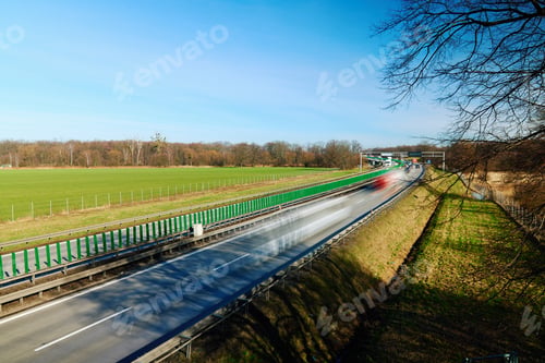 Preview: Traffic on motorway with motion blurred cars