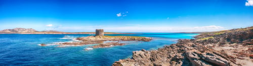 Preview: Stunning morning view of Famous La Pelosa beach and rocky shore near Torre della Pelosa.