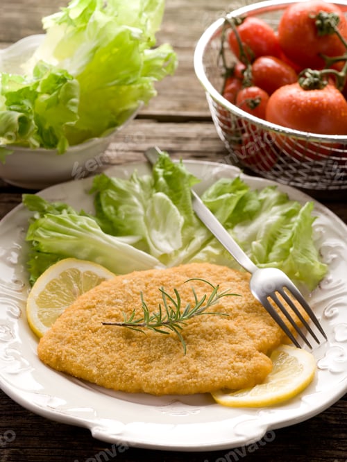 Preview: cutlet breaded with salad on dish