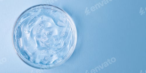 Preview: Top view of cosmetics gel with bubbly structure in the petri dish.Cosmetics banner with copy space.