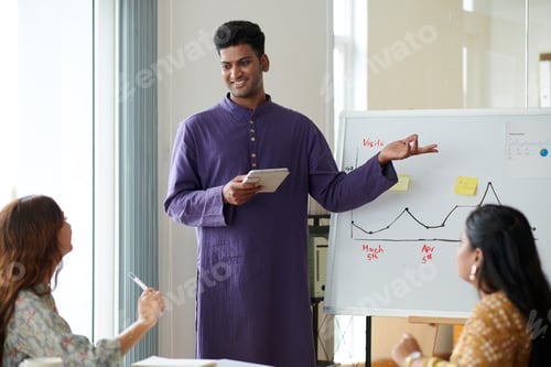 Preview: Businessman Answering Questions of Colleagues
