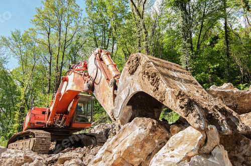 Preview: Excavator with big shovel to work with rocks