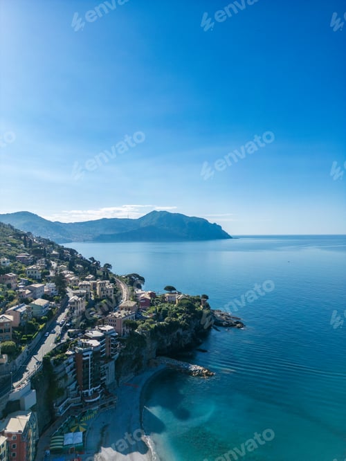Preview: Seaside village with sandy beach and crystal blue waters, the town of Sori, in Liguria