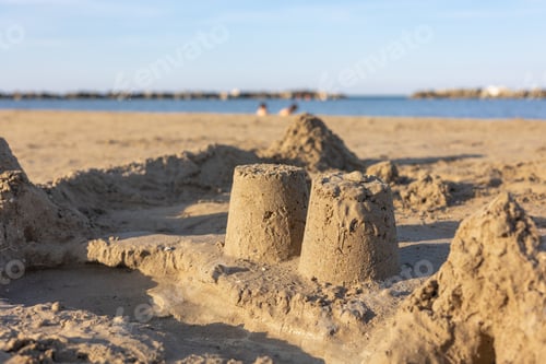 Preview: Sandcastles on the Shoreline. Vacation concept