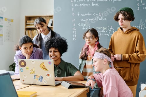 Preview: Teacher teaching IT to students