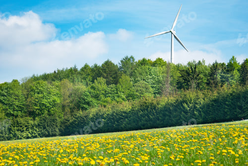 Preview: White generating electricity windmill under clear blue sky