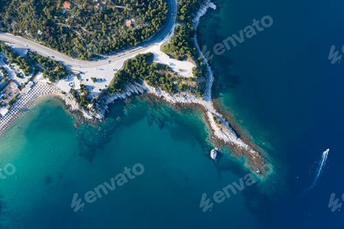 Preview: Aerial drone view of a remote rocky peninsula in Greece.