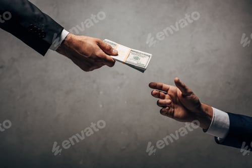 Preview: cropped view man giving bribe to business partner on grey