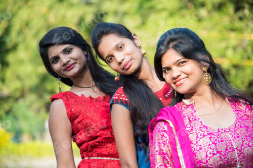 Preview: Happy Indian young girls smiling and having fun at outdoor.