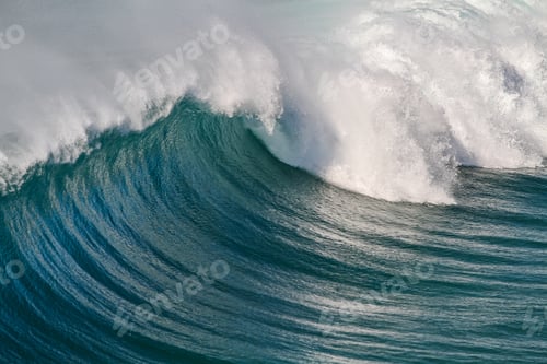 Preview: Closeup shot of the ocean waves creating a beautiful curve in Fuerteventura, Canary Islands