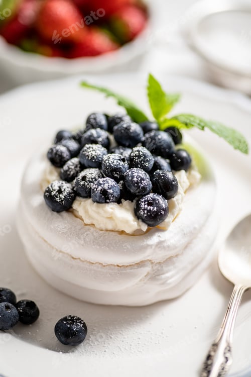 Preview: Delicious Pavlova Cake Dessert with Blueberries and Strawberries
