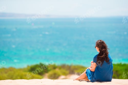 Preview: Young woman enjoy tropical beach vacation