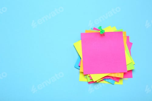 Preview: Many colorful notes on turquoise background. Space for text
