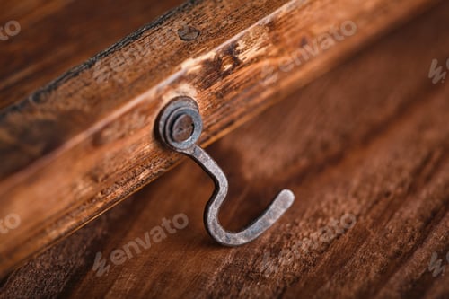 Preview: Door Hinges Against A Wooden Background. Rusty Iron Details On A Dark Wooden Background.