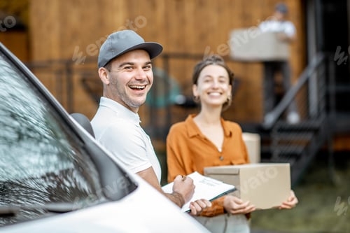 Preview: Couriers delivering goods to a woman home