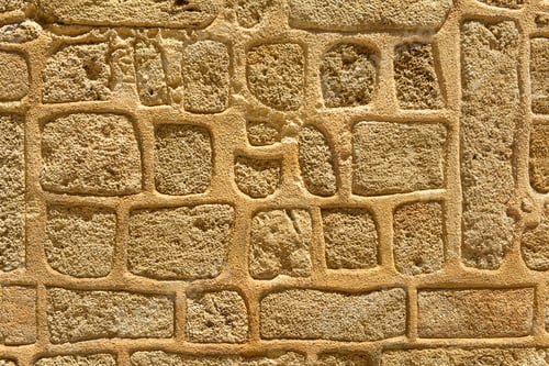 Preview: Ancient stone wall with rough, textured stones of varying sizes and shapes.