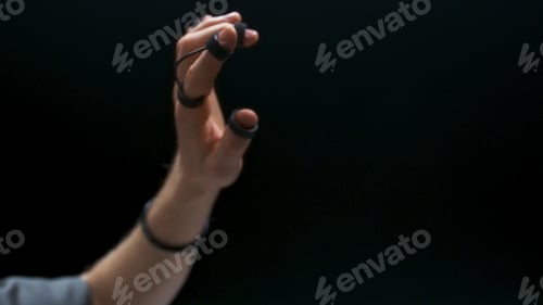 Preview: Haptic sensors gamer arms touching interface closeup. Man enjoying metaverse