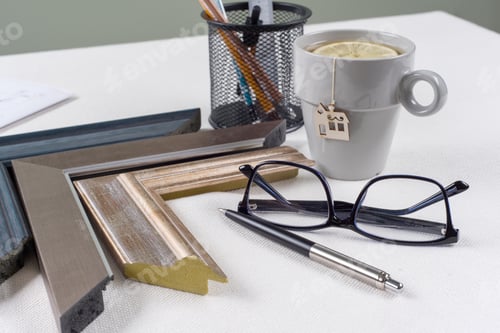 Preview: Home renovation. Workplace of the architect, designer with drawings, samples of decorative materials