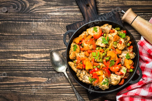Preview: Chicken Stir fry with vegetables on wooden table