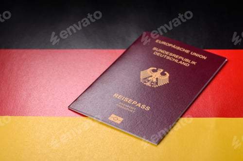 Preview: German citizen passport against the background of the German national flag
