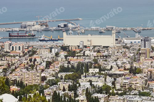 Preview: Seaport in the city of Haifa, panorama of the port and city buildings against the background