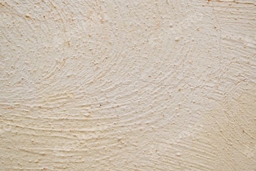 Preview: Textured Beige Wall with Cracks Background