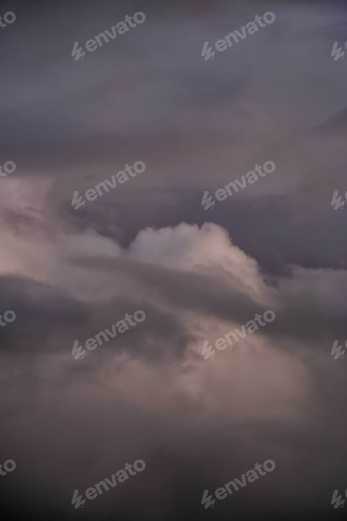 Preview: Dramatic View of a cloudscape during a dark, rainy and colorful sunset