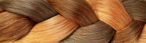 Preview: Different color female hair on whole background, close up