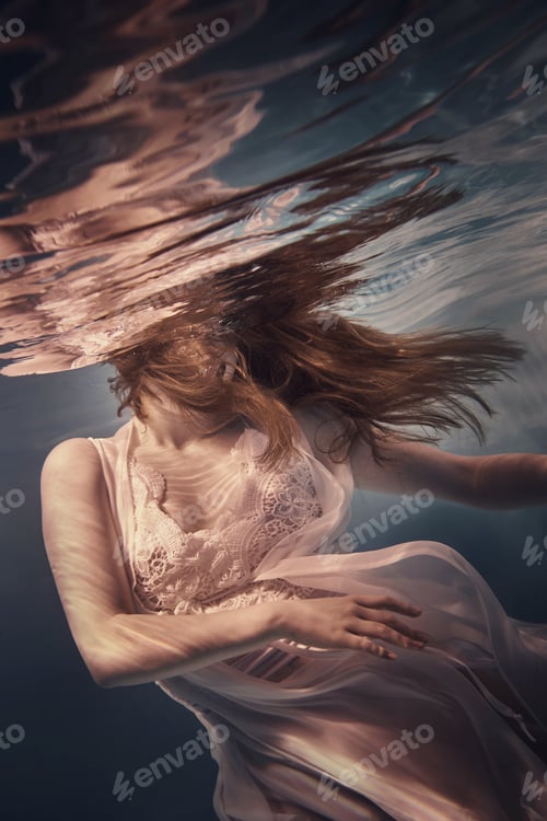 Preview: Portrait Of A Girl In A Dress Under Water