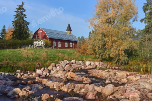 Preview: Autumn pond and church in Finnish Kellokoski in Europe.