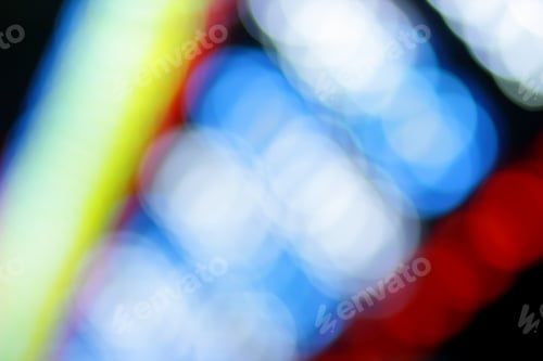 Preview: Blue, Red, Yellow, Blue, White Blurred Festive Bokeh Background With Stars For Christmas