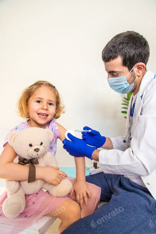 Preview: The child is being treated by a doctor is vaccinating. Selective focus.