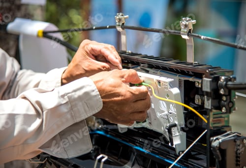 Preview: Technicians are install cabinet on fiber optic cable.