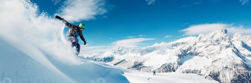 Preview: Snowboarder in Action on Mountain Wide Banner